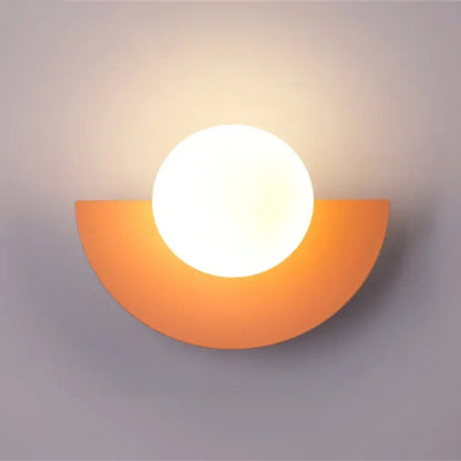Applique murale Bauhaus rose avec globe lumineux rond au design rétro