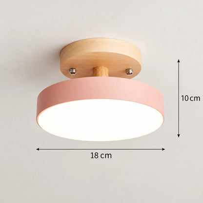 Plafonnier LED rond rose pastel et bois naturel de 18 cm de diamètre