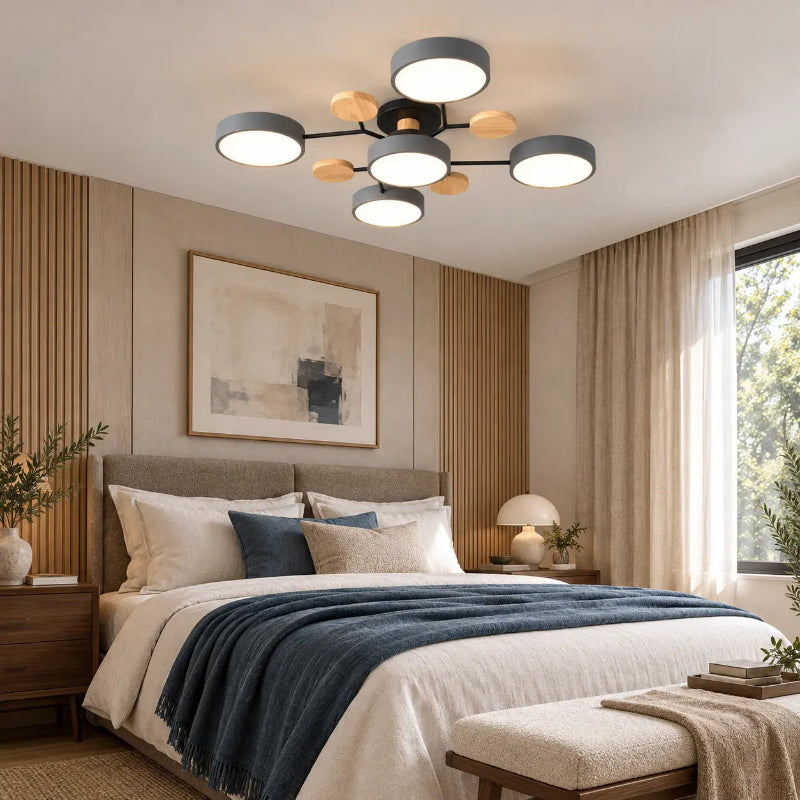 Plafonnier LED Arbor-Lumière au design scandinave installé dans une chambre moderne