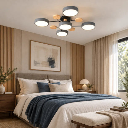 Plafonnier LED Arbor-Lumière au design scandinave installé dans une chambre moderne
