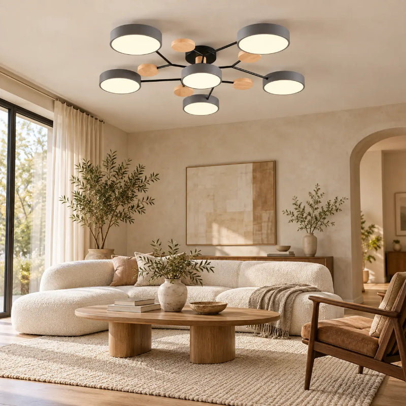 Plafonnier LED design nordique avec branches géométriques dans un salon contemporain