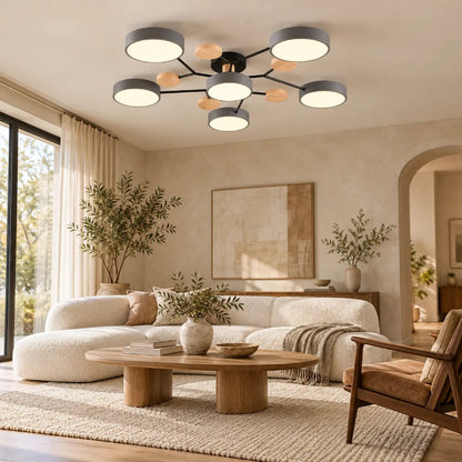 Plafonnier LED design nordique avec branches géométriques dans un salon contemporain